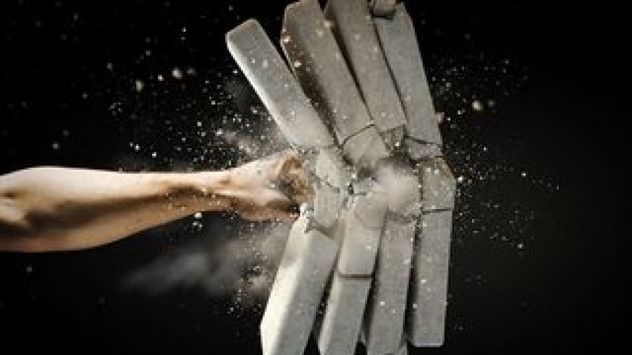 Bigstock-Close-up-of-human-hand-breakin-54368582