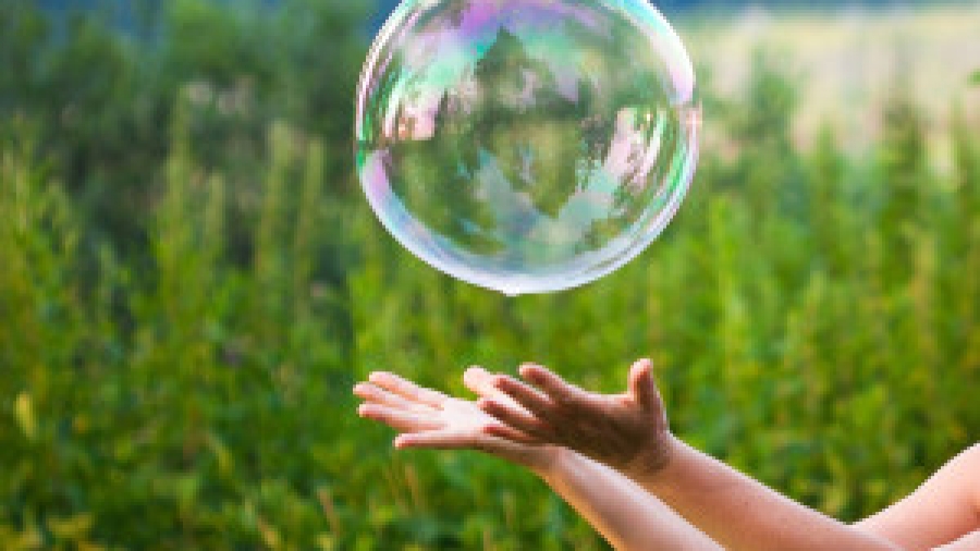 Bigstock-hand-catching-a-soap-bubble-26919833-300x275