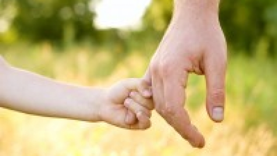 bigstock-trust-family-hands-of-child-so-27258686