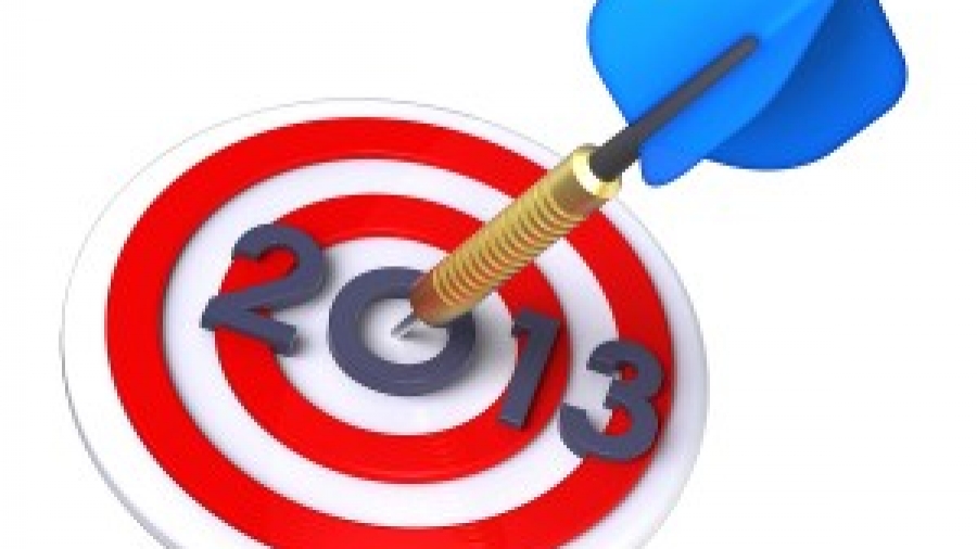 Bigstock-Dart-hitting-target-New-Year-31745273-300x257